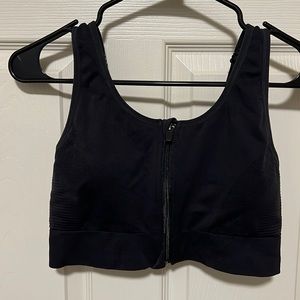 Black zip front sports bra